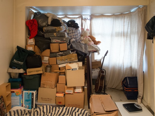 cardboard boxes stacked in room